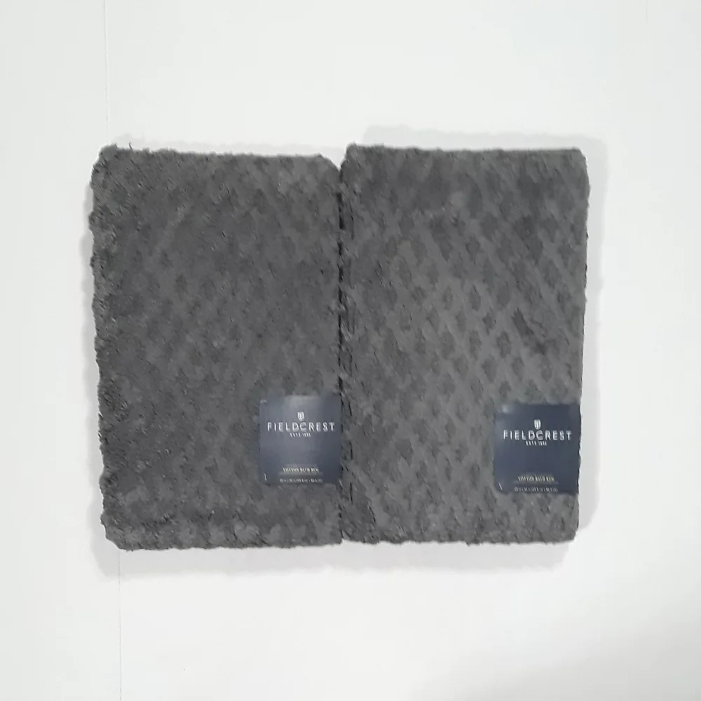 Fieldcrest reserved collection cotton bath rugs.